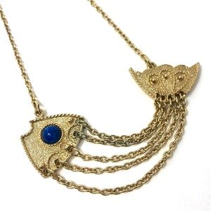 Sarah Coventry gold tone fish pendant necklace w/ faux lapis lazuli cabochon